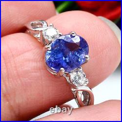 7 X 9 mm. OVAL BLUE TANZANITE & WHITE cubic zirconia RING 925 STERLING SILVER