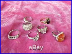 Lot Of 7 Sterling Silver And Cubic Zarconia Cocktail Rings Varying Sizes