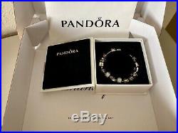 Pandora bracelet with 15 charms, to include gold & cubic zirconia plus 1 clip