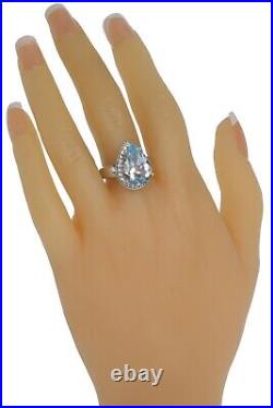 Sky Blue Topaz Gemstone Pear Cubic Zirconia Halo Raised Sterling Silver 925 Ring