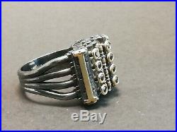 V8 engine ring with 8 black cubic zirconia, black rhodium and gold details