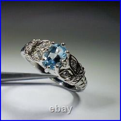 Vintage Sterling Silver Natural Oval Blue Topaz And Cubic Zirconia Earrings Ring